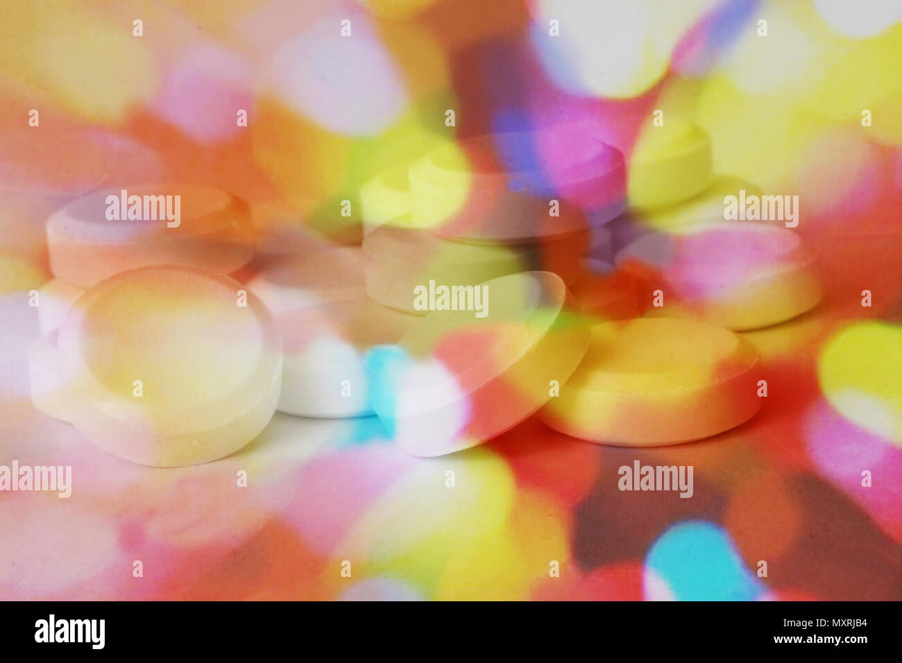 Pile of pills in color fantasy with psychedelic colors showing ...