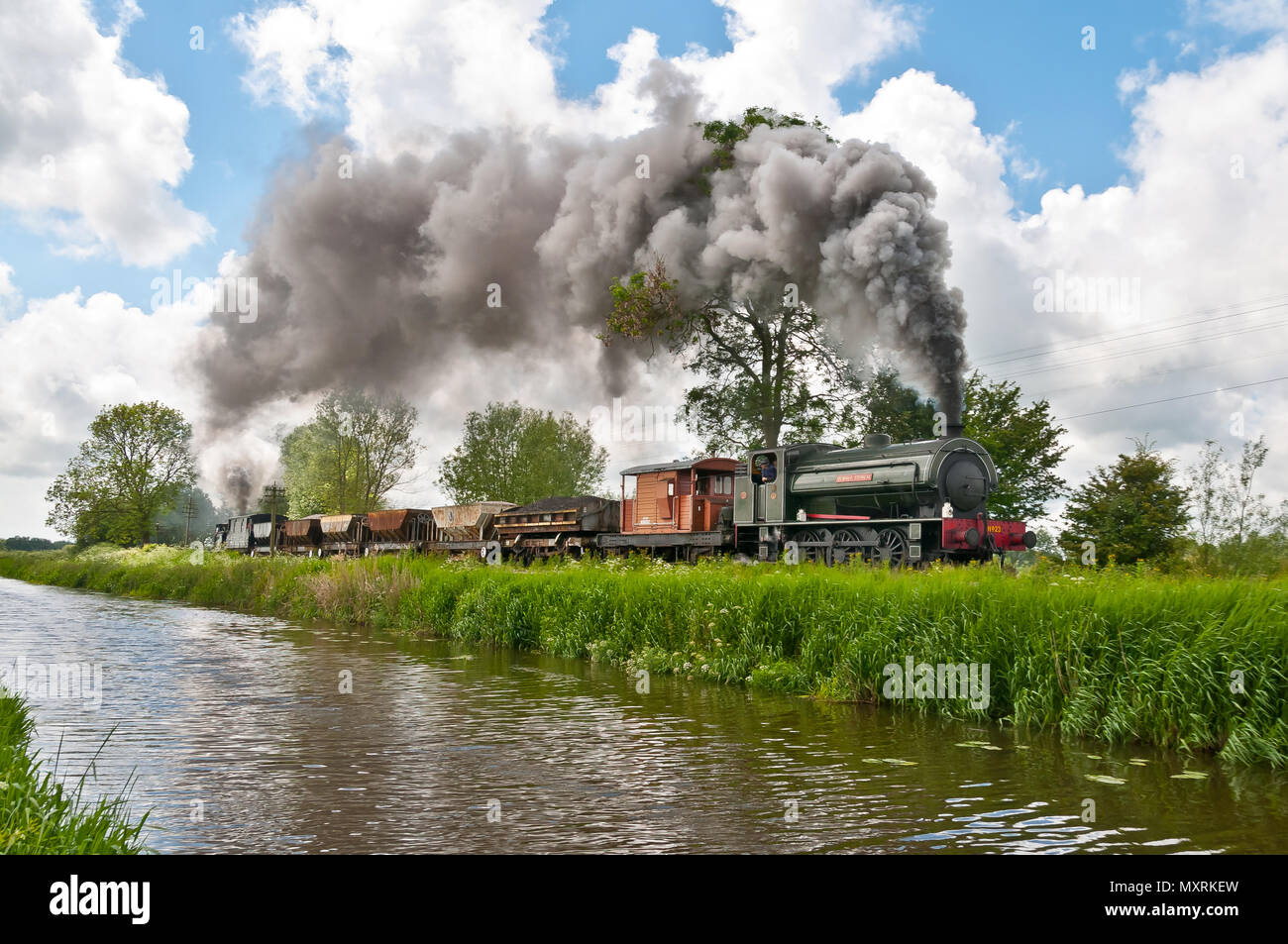 Steam engine with freight train on the Kent and East Sussex Railway Stock Photo