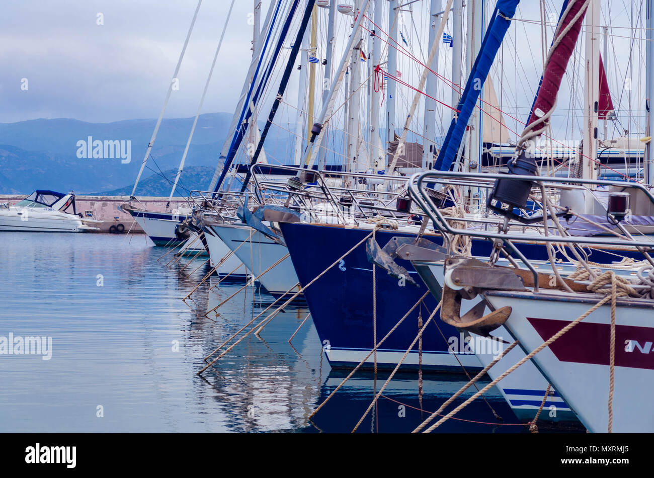 Agios Nikolaos Crete, - view of luxurious yachts  tied up at the dock of marine of cosmopolitan city of Agios Nikolaos. Stock Photo