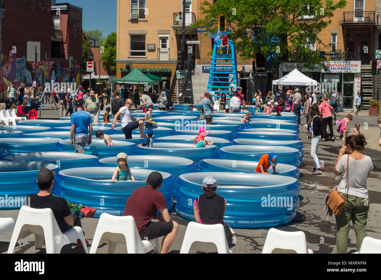 Montreal, Canada 3 June 2018 Inflatable pools during summer Street