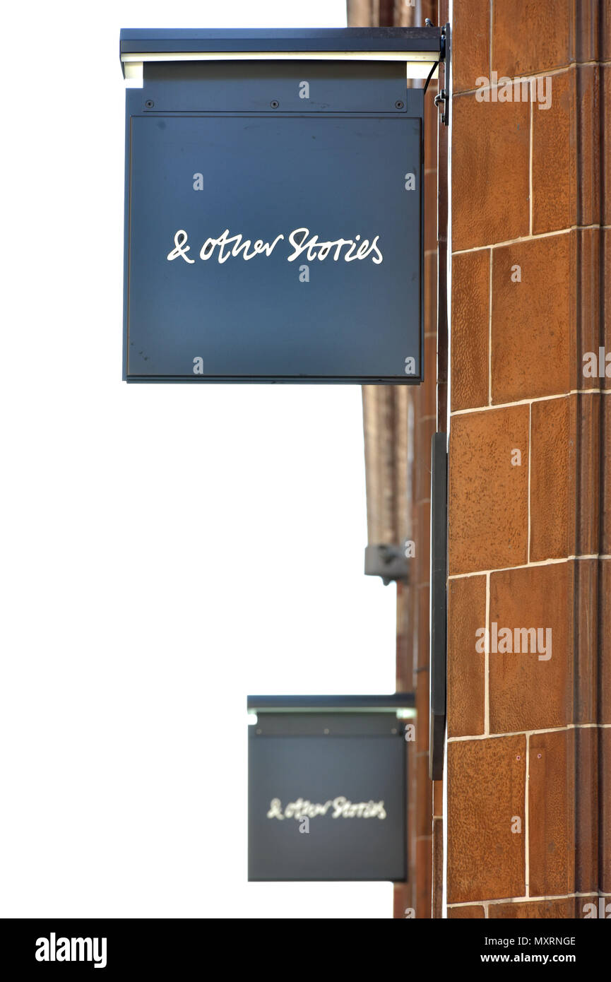 The brand logo of the H&M Group women’s clothing retailer & Other Stories, in Covent Garden, London. Stock Photo