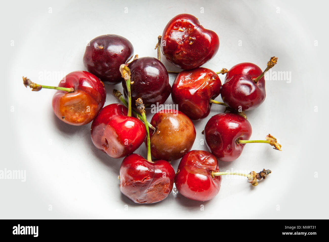 rotten cherries view from above Stock Photo