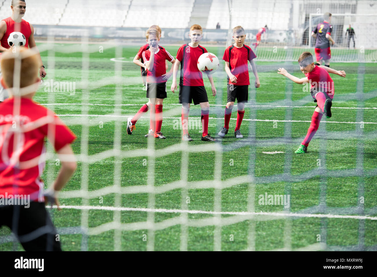 Boy scoring goal hires stock photography and images Alamy