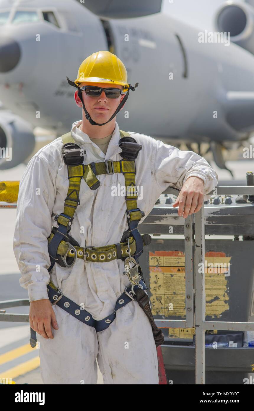 Airman 1st Class Ryan Hobbs, 380th KC-10 crew chief, after completing an intake and exhaust inspection on engine 2 of a KC-10 aircraft, Al Dhafra Air Base, United Arab Emirates, May 29, 2018, May 29, 2018. As a crew chief Hobbs conducts inspections and repairs KC-10 engines. (U.S. Air Force photo by Staff Sgt. Ross A. Whitley). () Stock Photo