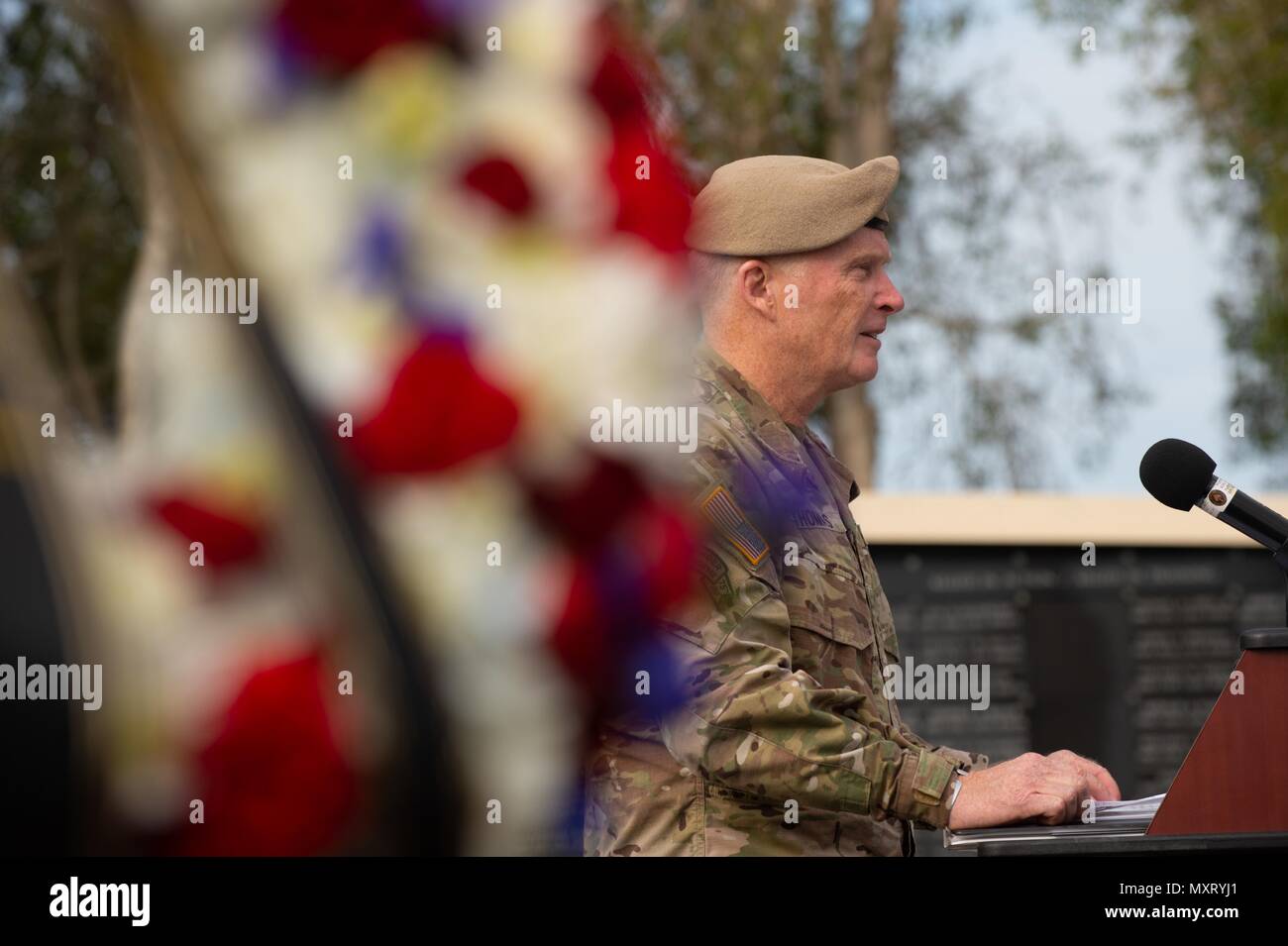 Army Gen. Raymond A. Thomas III, commander, U.S. Special Operations Command, speaks during a Memorial Day observation at the Special Operations Memorial on MacDill Air Force Base, Fla. May 24, 2018, May 24, 2018. The federal holiday serves as a time to honor service members who died while serving in the armed forces. (Photo by U.S. Air Force Master Sgt. Barry Loo). () Stock Photo
