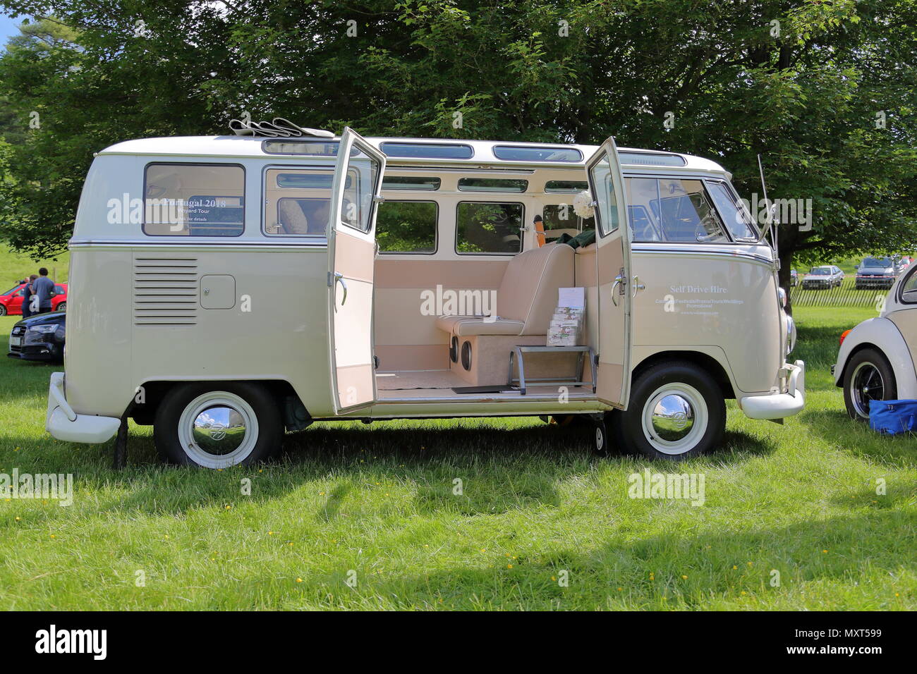 All types of historic Volkswagen cars and vans were displayed at this years's gathering of their owners. Fans could get close to well-loved vehicles. Stock Photo