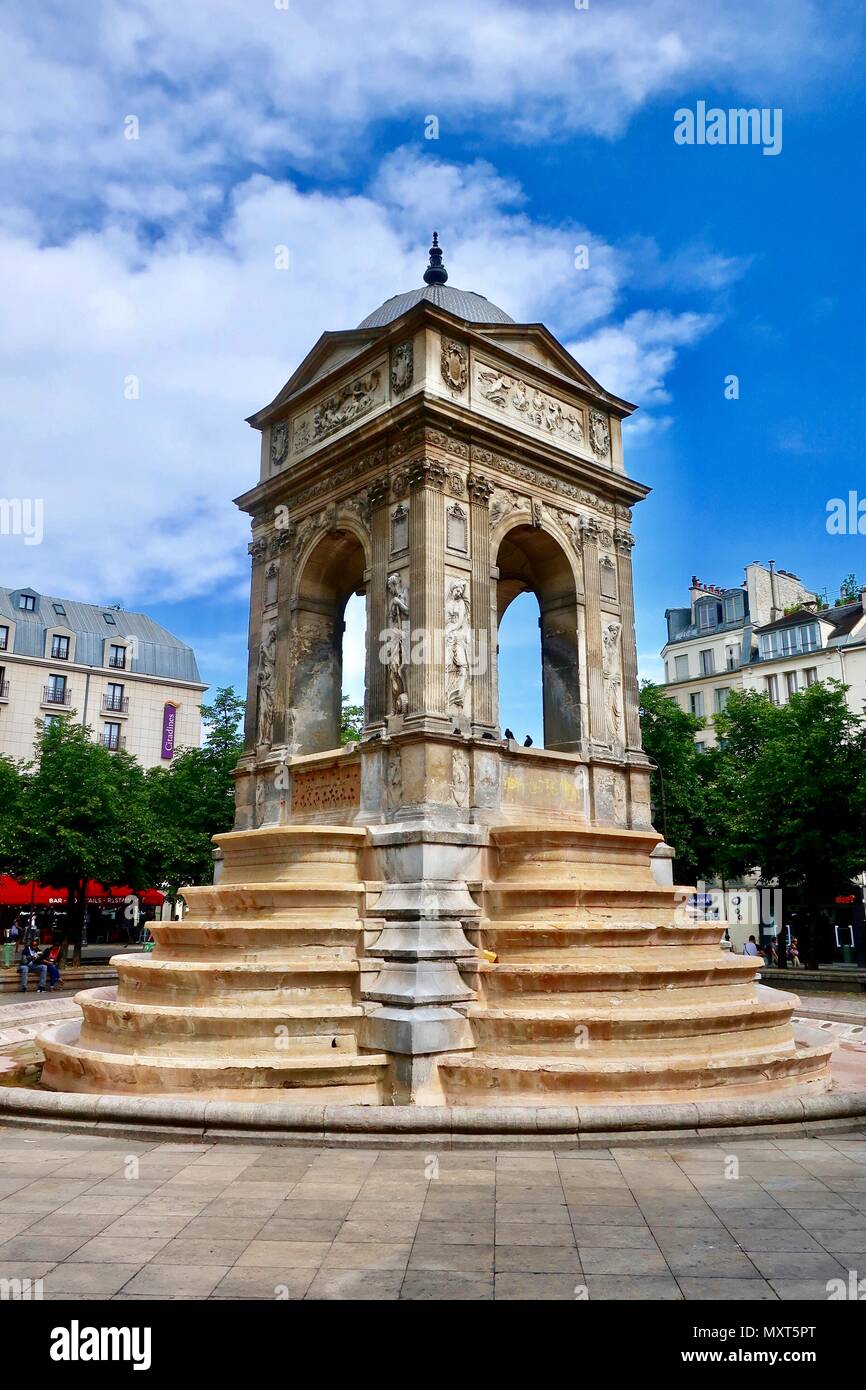 Paris, France. Hot bright sunny spring day, May 2018. Fontaine des Innocents in Les Halles. Stock Photo