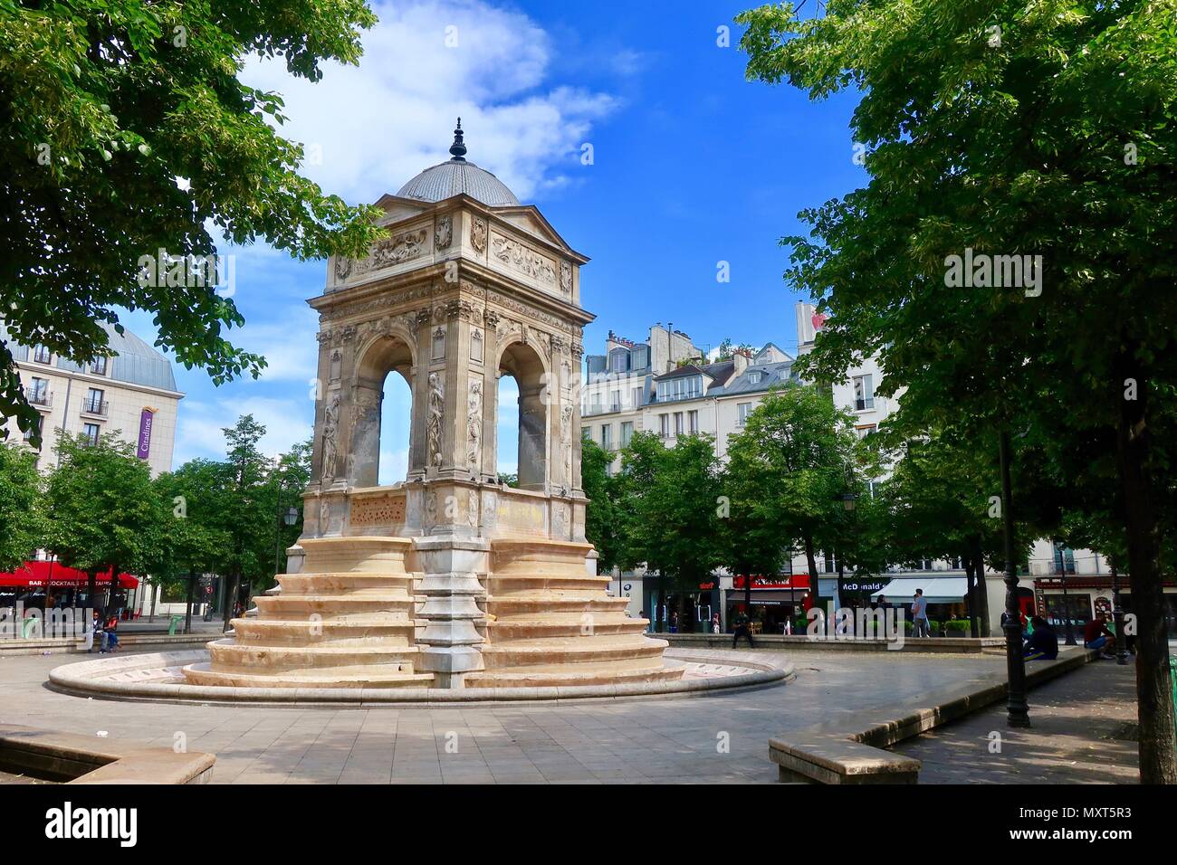 Paris, France. Hot bright sunny spring day, May 2018. Fontaine des Innocents in Les Halles. Stock Photo