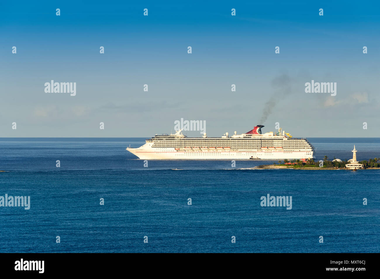 Nassau, Bahamas - March 1, 2018:  The Carnival Pride cruise ship departing from the Port of Nassau in the Bahamas, as it sails on the Caribbean Sea to Stock Photo