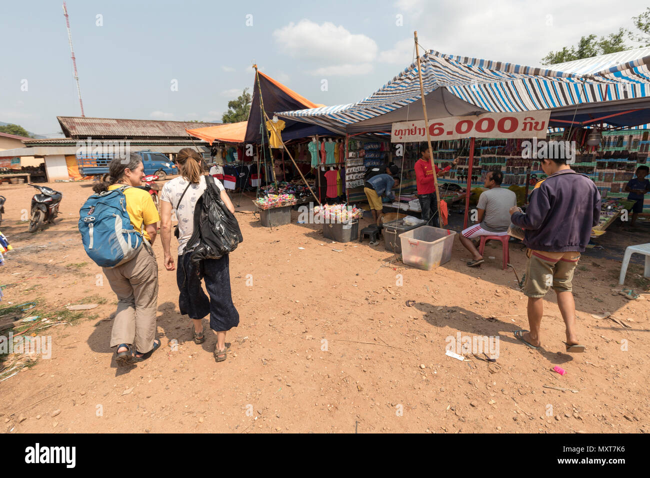Two women walking through market, Boualapha, Laos Stock Photo