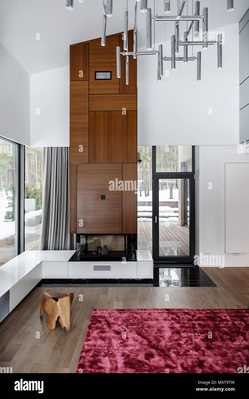 Interior In A Modern Style With White Walls And A Parquet With A