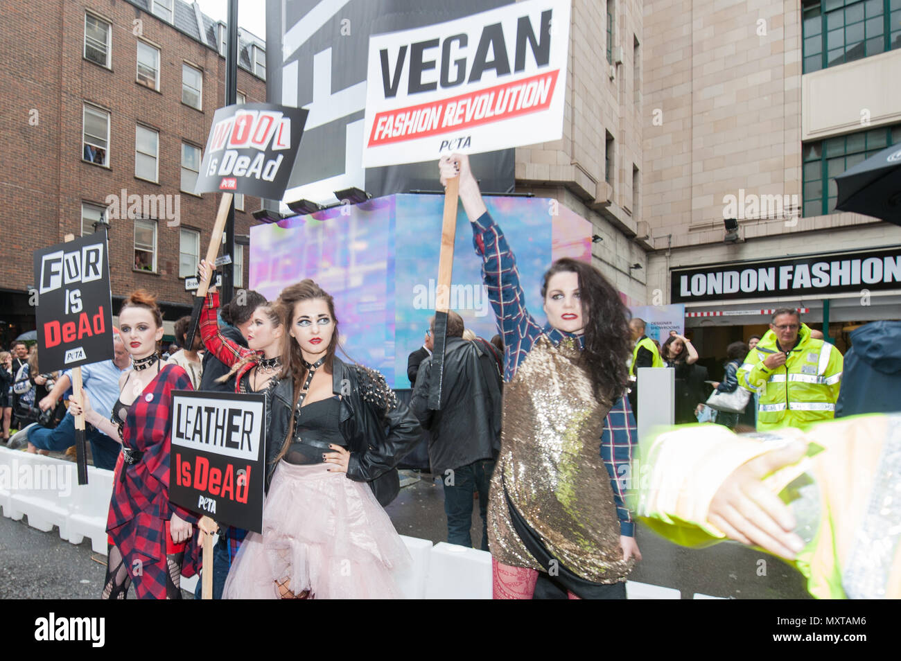 Brewer Street, Soho, London. September 16th 2016. As London celebrates 40 years of punk, PETA activists spark its own 'Vegan Fashion Revolution' outsi Stock Photo