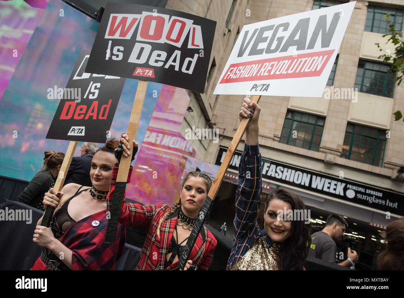 Brewer Street, Soho, London. September 16th 2016. As London celebrates 40 years of punk, PETA activists spark its own 'Vegan Fashion Revolution' outsi Stock Photo