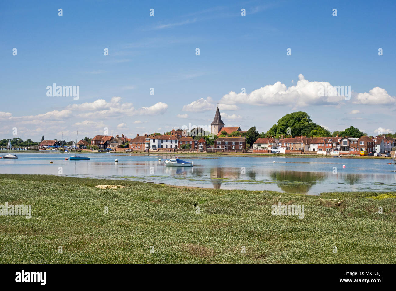 Bosham harbour in West Sussex as the tide comes in on a sunny day in June. Stock Photo