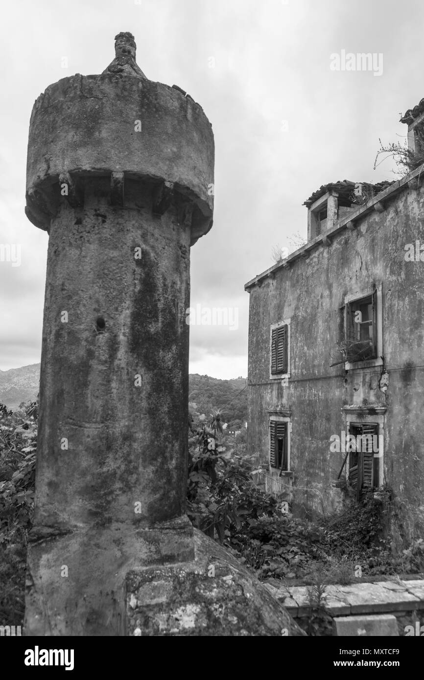 Ancient 'fumar' or chimney, characteristic of the architecture of Lastovo, Dubrovnik-Neretva, Croatia. Black and white version. Stock Photo