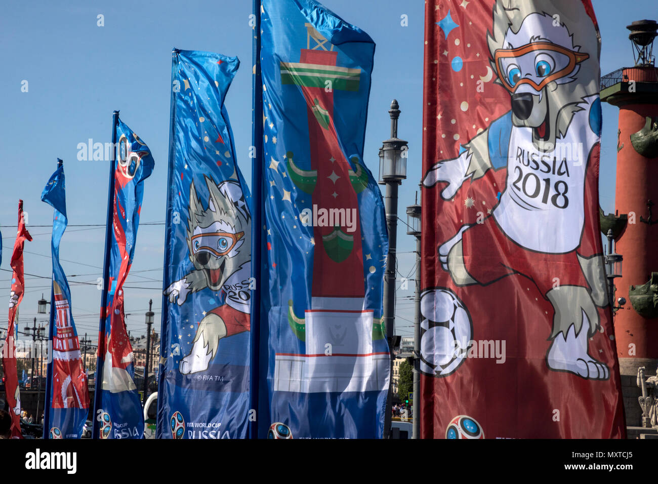 Flags with the symbols of the World Cup FIFA 2018 against the background of the Rostral column are installed in the center of the city of St. Petersbu Stock Photo