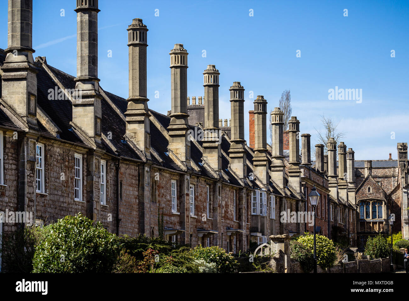 Medieval Vicars Close - row of tall chimney stacks taken in Vicars Close, Wells, Somerset, UK on 23 April 2013 Stock Photo