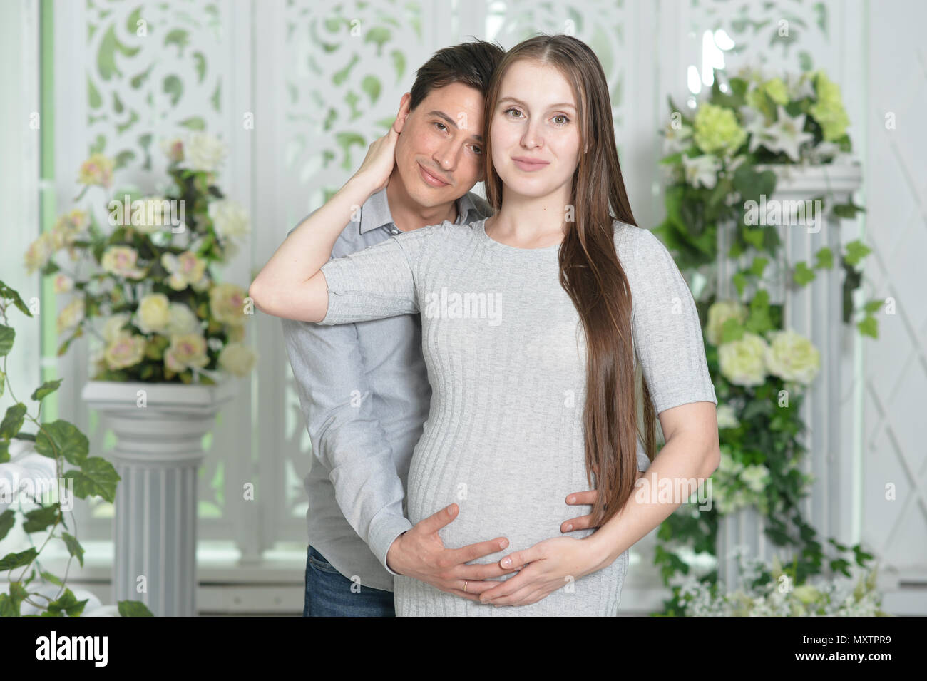 happy-pregnant-woman-with-husband-stock-photo-alamy