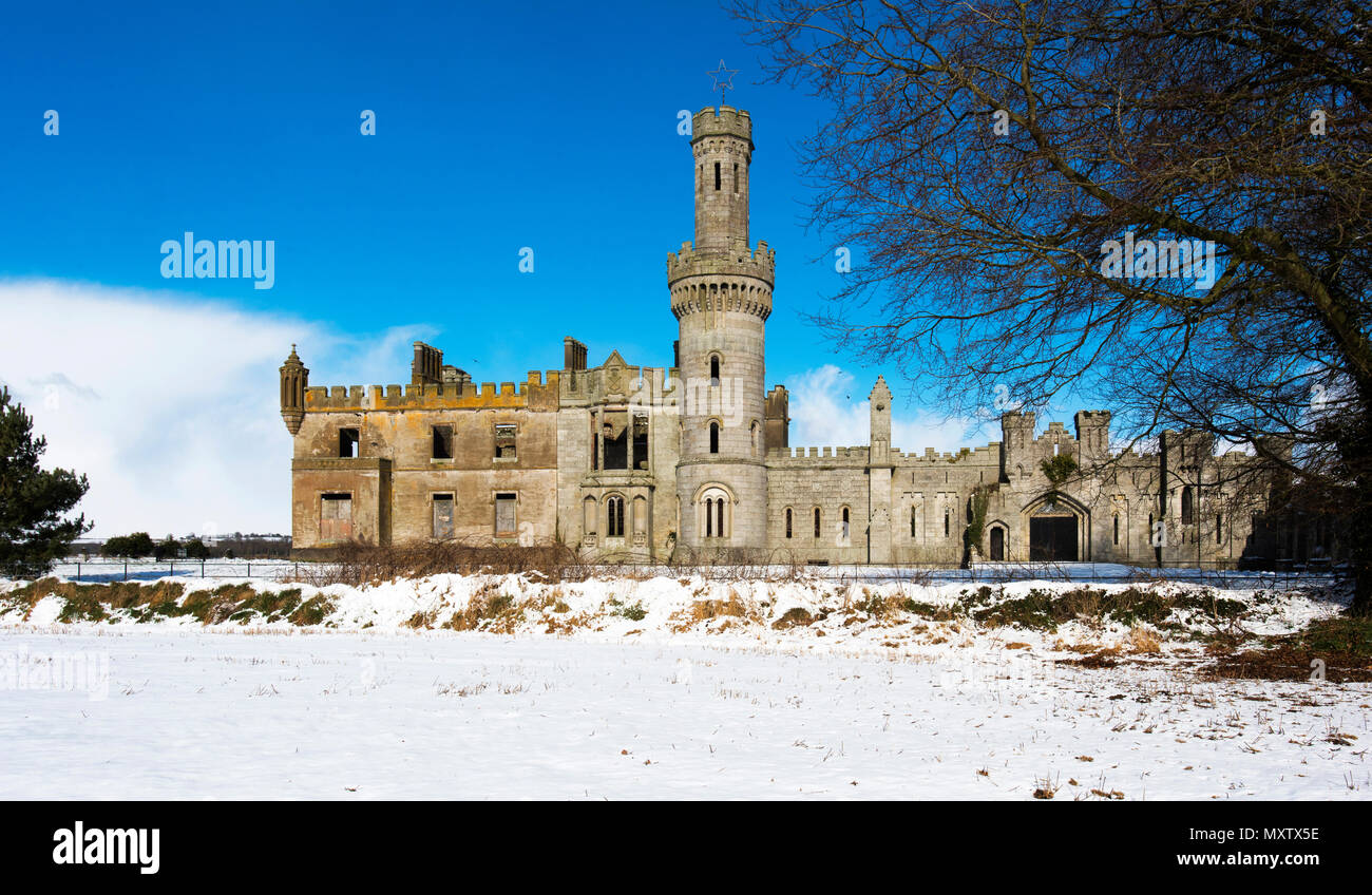 Ruins of a Gothic Revival 19th century estate house Stock Photo