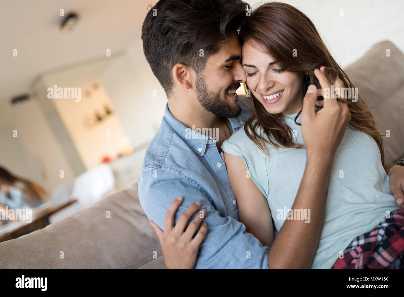 Young couple spending time together at home Stock Photo
