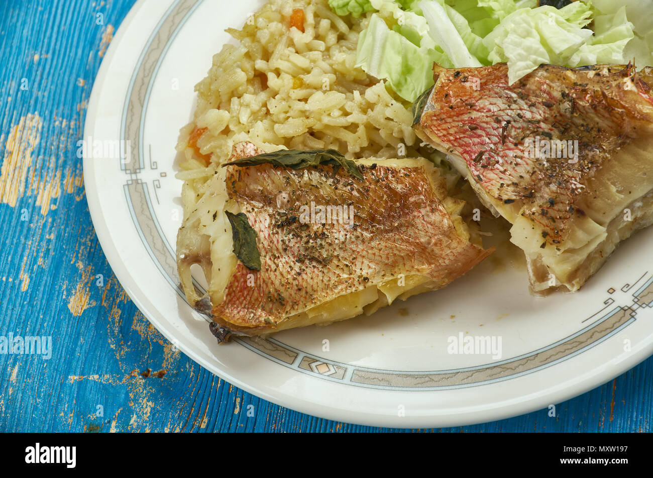 Jamaican Brown Stew Fish sea bass Stock Photo Alamy