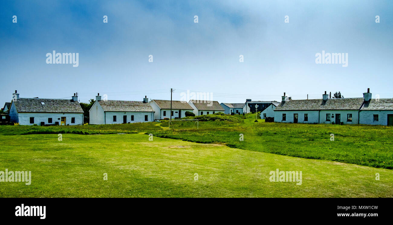 White painted cottages on Easdale Island Stock Photo