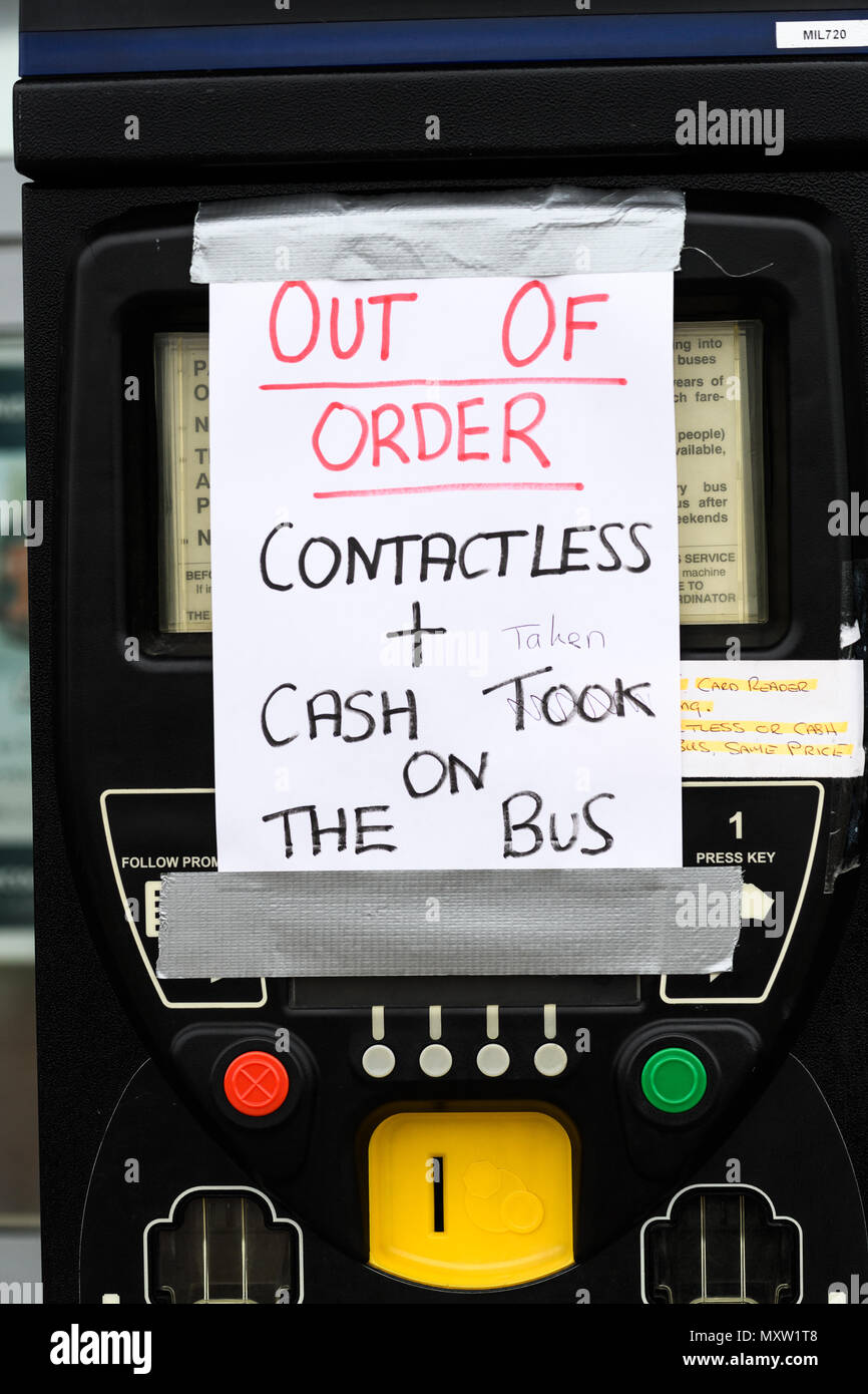 Corrected grammar on an 'out of order' notice stuck to a ticket machine at the Milton terminus of the Park and Ride bus service, Cambridge, England. Stock Photo