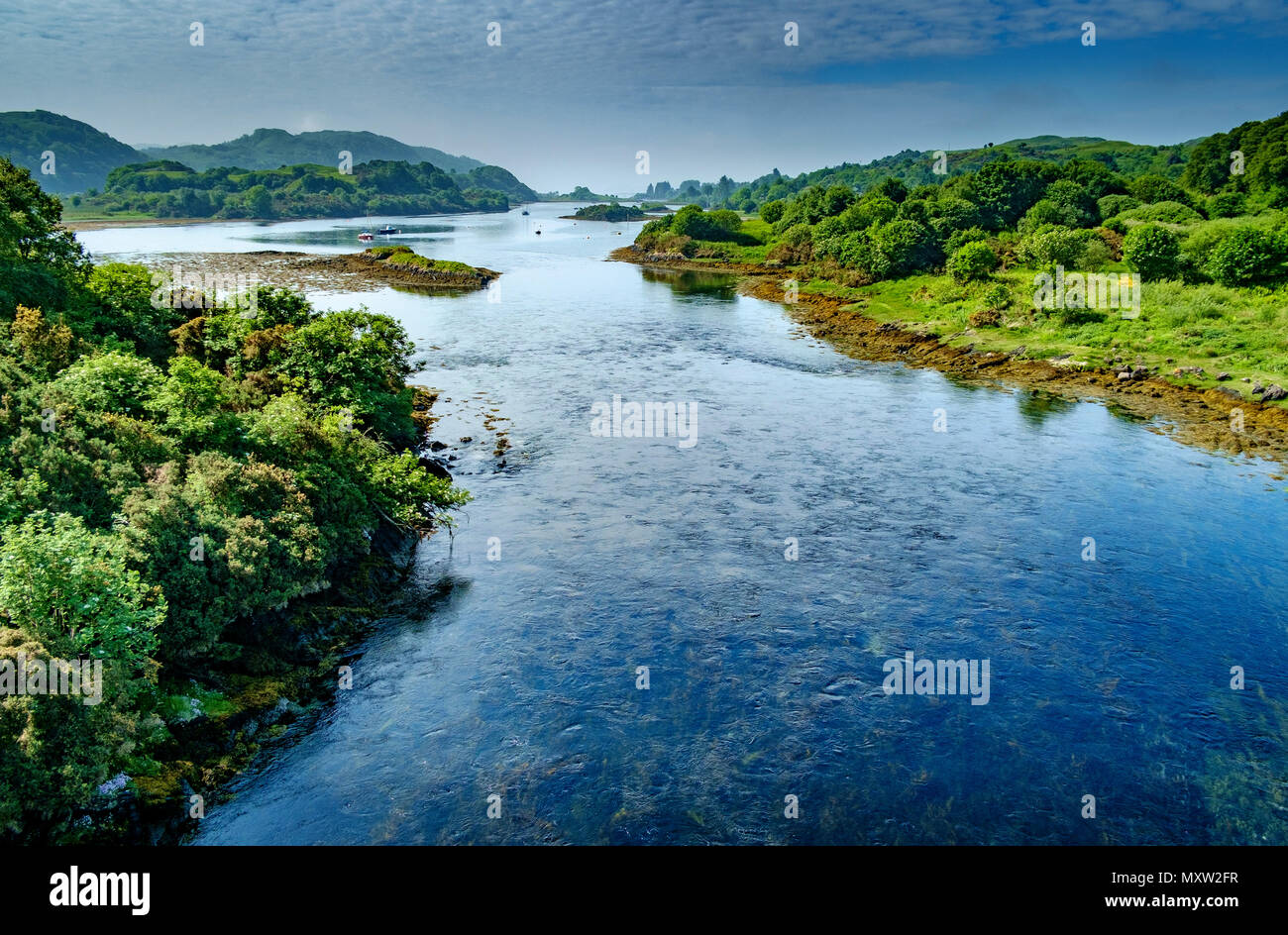The Atlantic Ocean between Seil Island (on the right) and the Scottish mainland. Stock Photo