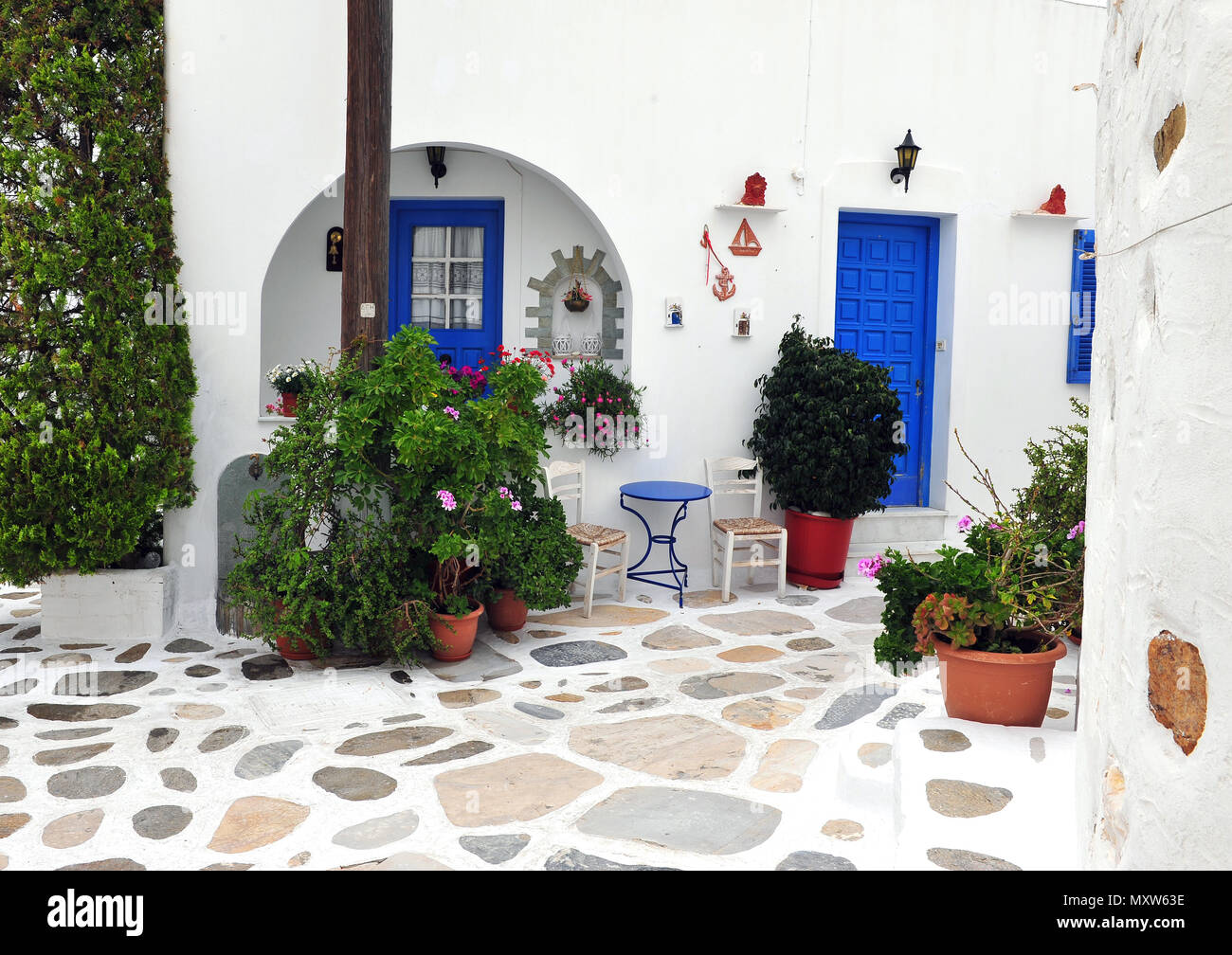 Traditional patio in small greek village, Paros Stock Photo Alamy