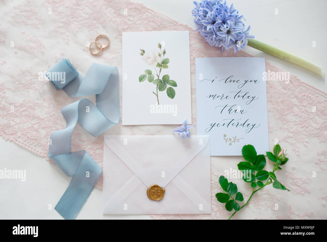 wedding invitation card as a decorated letter with flowers