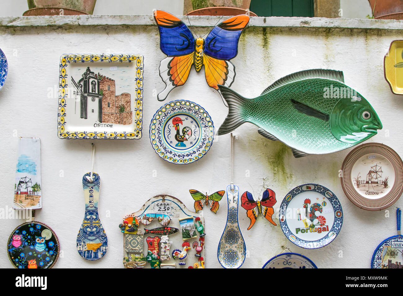 Touristy souvenirs for sale at the streets of Obidos, Portugal. Stock Photo