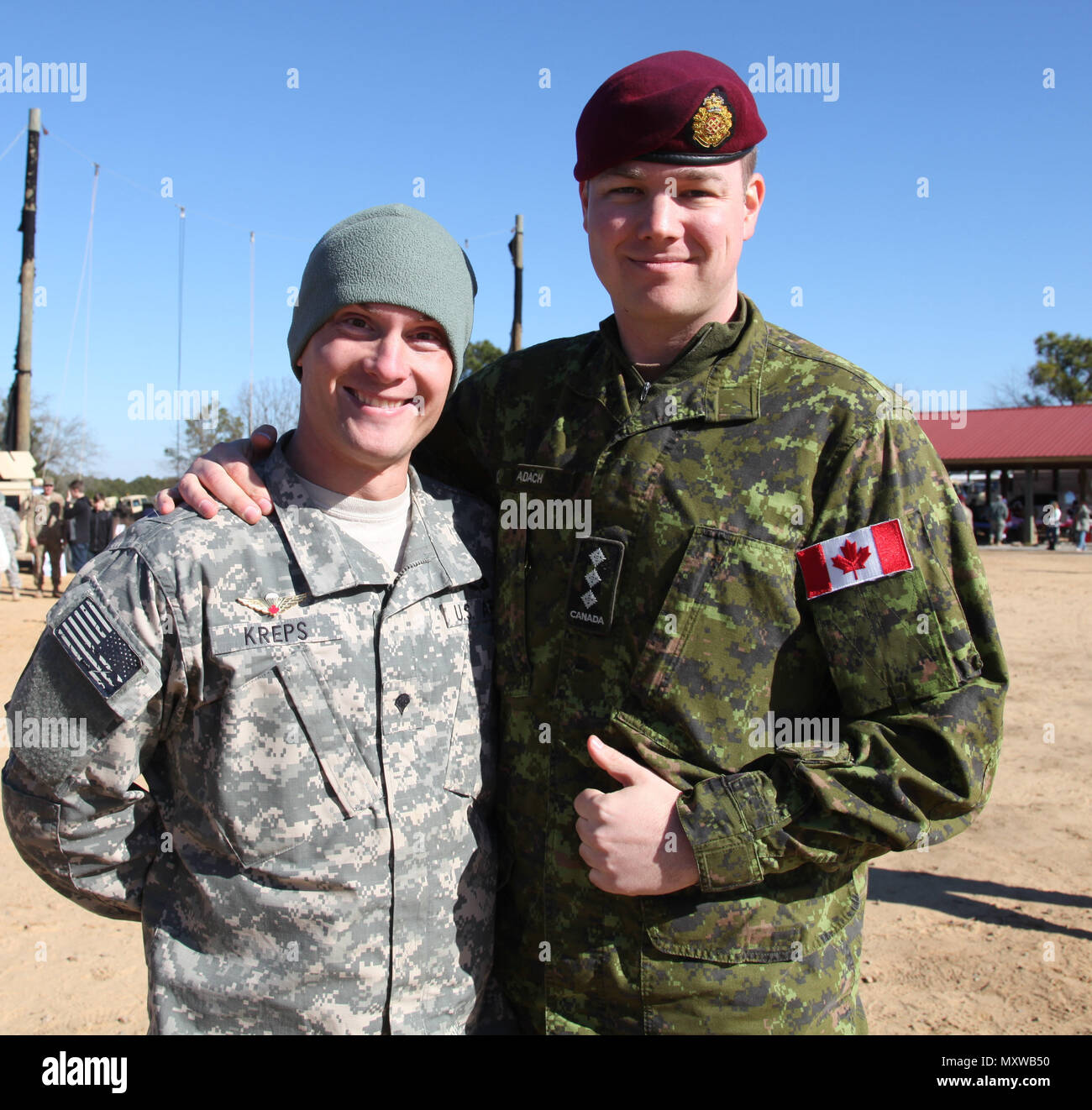 Spc. Matthew G. Kreps, 118th Military Police Company, 503d Military Police  Battalion (Airborne), 16th Military Police Brigade, XVII Airborne Corps  (Airborne) receiving his Canadian jump wings during Operation Toy Drop XIX.  This