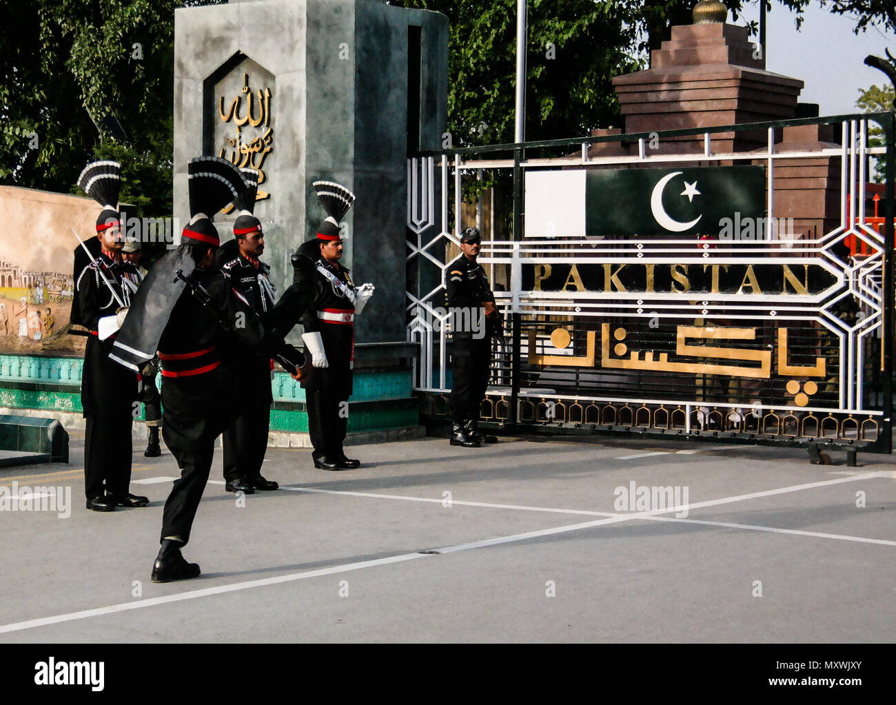 The marching Pakistani guards in national uniform at the ceremony of lowering the flags - 04-05-2015 border between Pakistan and India, Wagah, Lahore, Stock Photo