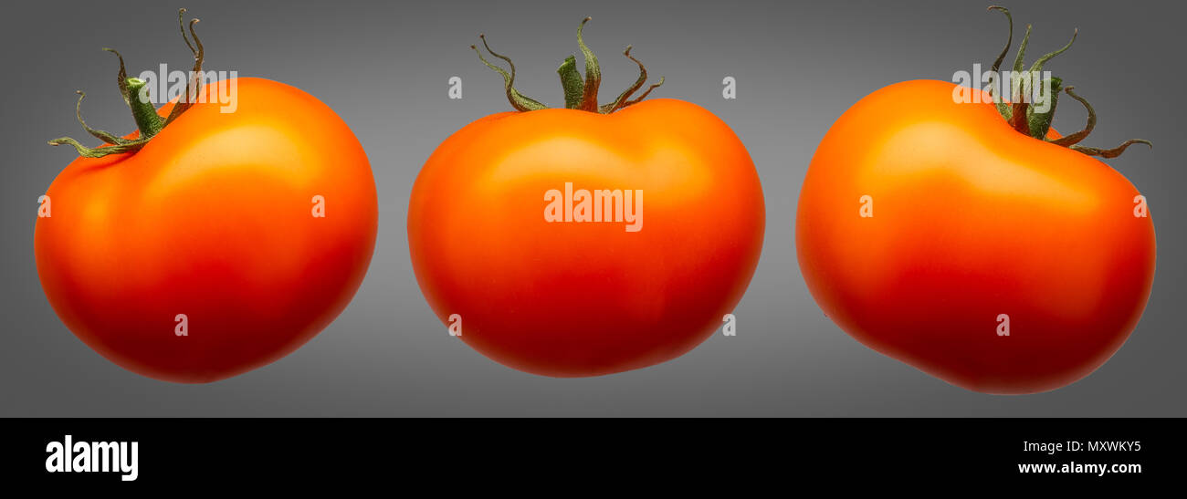Group of red tomatoes isolated on grey background Stock Photo - Alamy