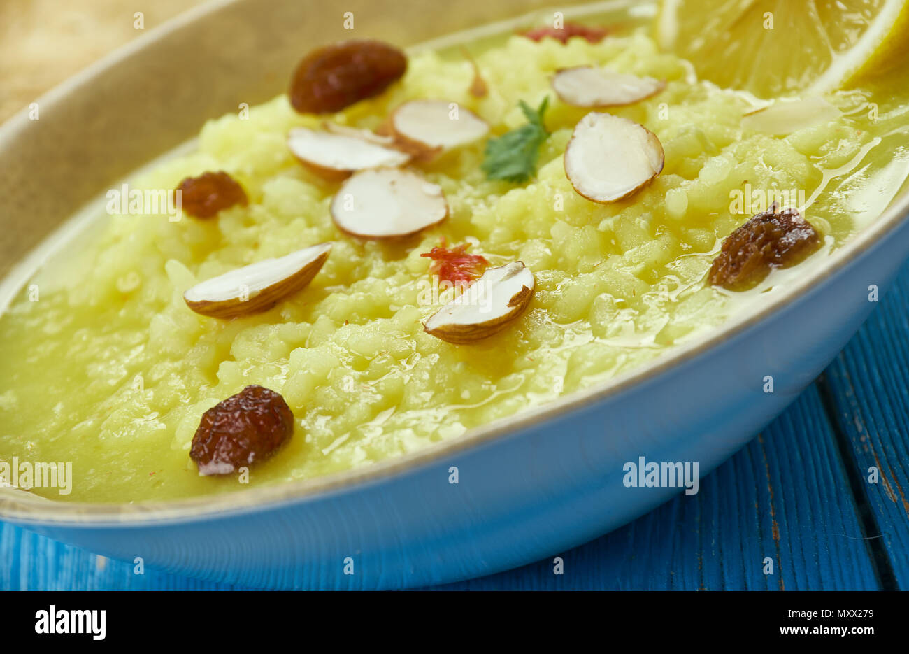 Pakistani cuisine , Palatable Kheer, condensed milk sugar and rice,  Indian version of rice pudding . Traditional assorted dishes, Top view. Stock Photo