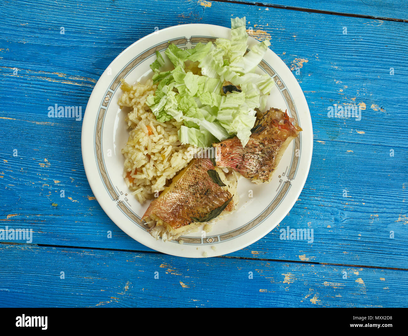 Jamaican Brown Stew Fish sea bass Stock Photo Alamy