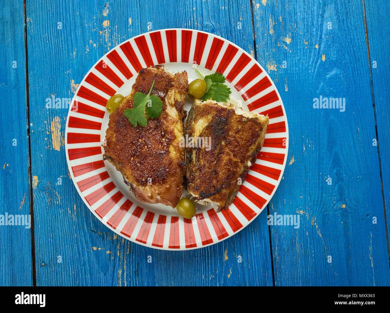 Lahori Tawa Tali Machli Fish fillet pieces dipped in creamy mixture