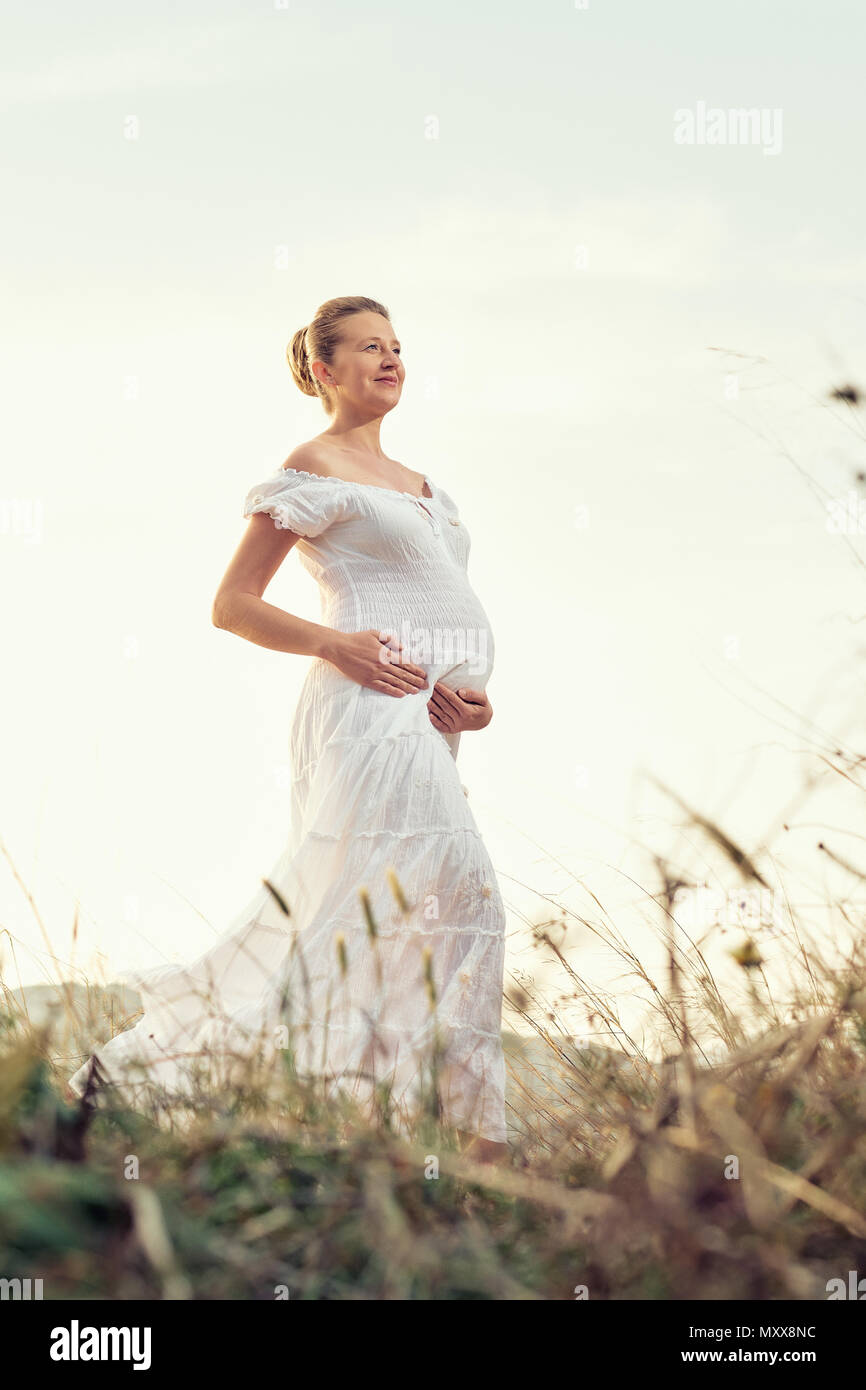 Attractive pregnant woman hi-res stock photography and images - Alamy