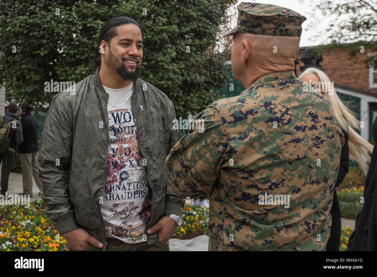 Commandant of the Marine Corps Gen. Robert B. Neller, right, speaks to Jey Uso, WWE wrestler, at the Home of the Commandants, Washington, D.C., Dec. 13, 2016. Uso and other Superstars were invited to meet with the Commandant, tour Marine Barracks Washington, and eat lunch with Marines. (U.S. Marine Corps photo by Cpl. Samantha K. Braun) Stock Photo