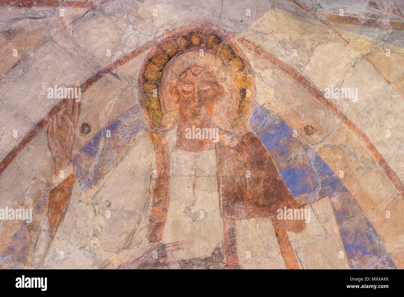 Christ pantocrator a solemn romanesque mural in Vinslov church, Sweden, May 9, 2018 Stock Photo