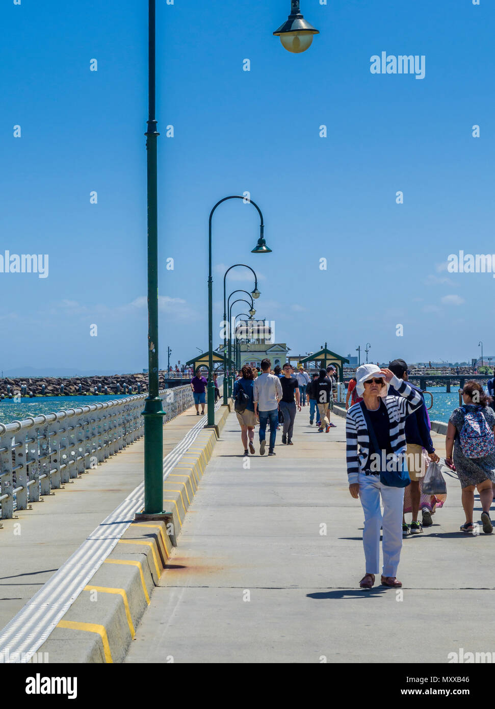 People walking along St Kilda pier, Melbourne, Victoria, Australia