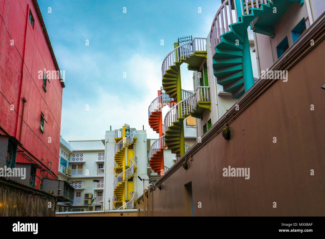back alley in bugis with colorful stairways. Stock Photo