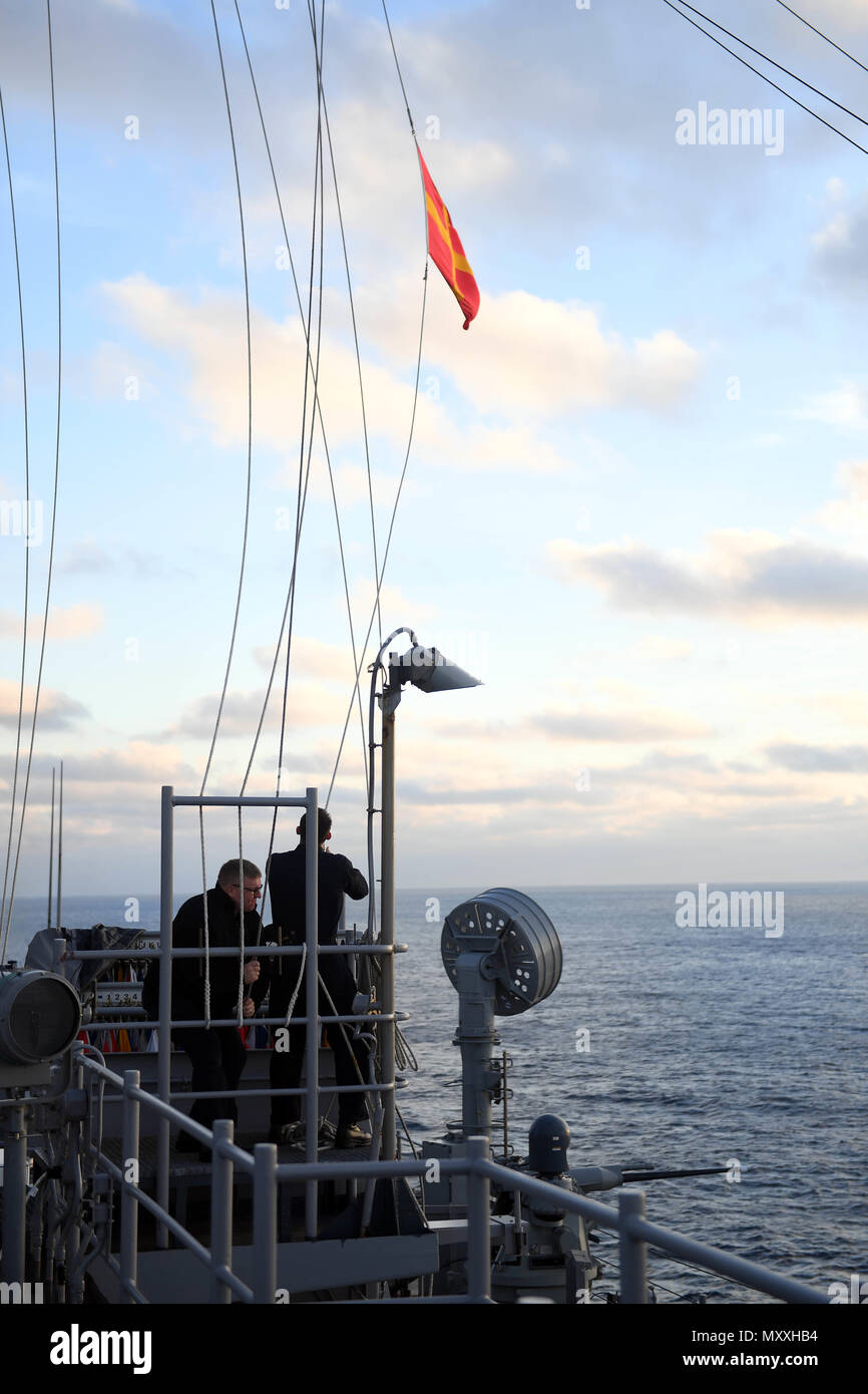 Unrep Flags 161208-N-ME988-060 ATLANTIC OCEAN (Dec. 08, 2016) – Sailors aboard the ...