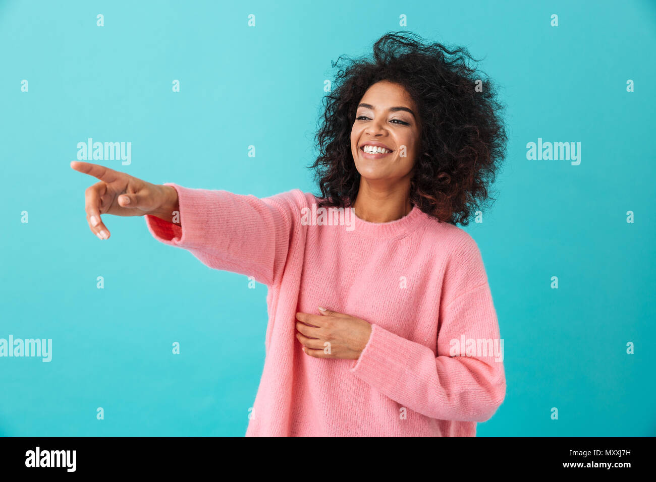 Woman index finger smile hi-res stock photography and images - Alamy