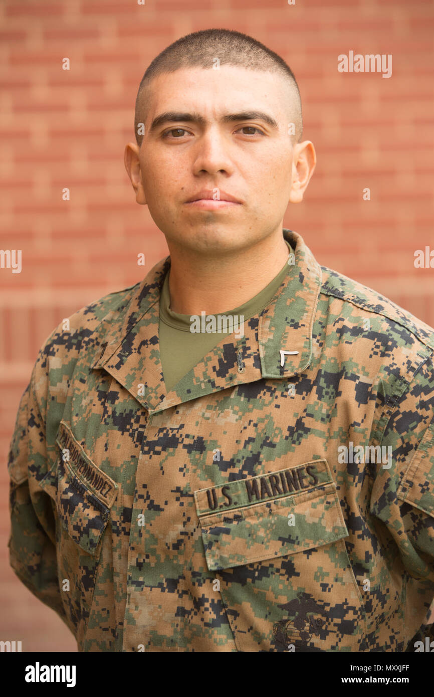 Pfc. Diego A. Palacios Hernandez, Platoon 3102, India Company, 3rd Recruit Training Battalion, earned U.S. citizenship Dec. 8, 2016, on Parris Island, S.C. Before earning citizenship, applicants must demonstrate knowledge of the English language and American government, show good moral character and take the Oath of Allegiance to the U.S. Constitution. Palacios Hernandez, from Queens, N.Y., originally from Colombia, is scheduled to graduate Dec. 9, 2016. (Photo by Lance Cpl. Maximilliano Bavastro) Stock Photo