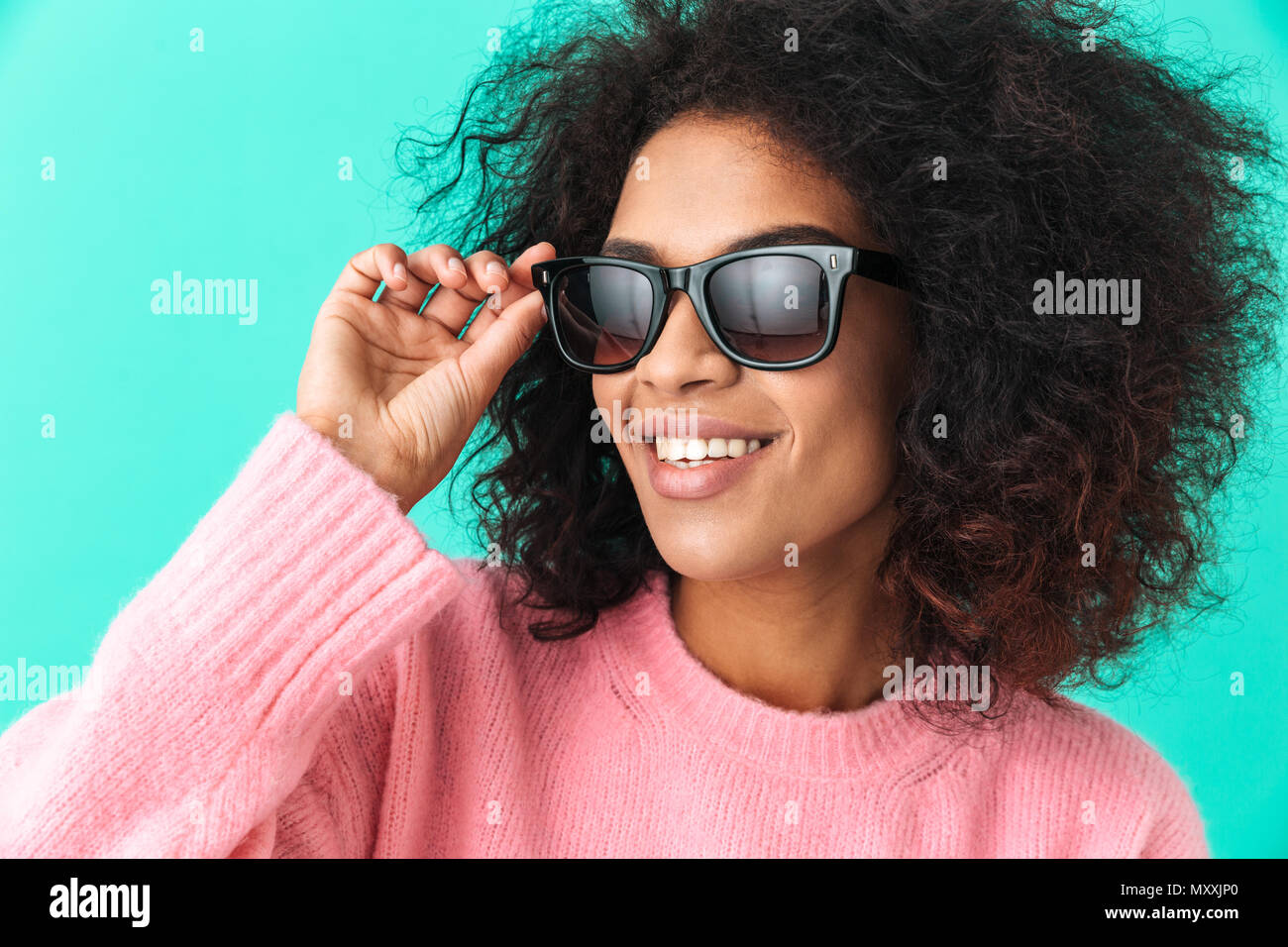 Woman wearing pink shirt glasses hi-res stock photography and images ...