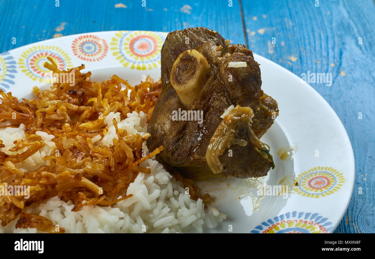 Qozi Lamb - Traditional Middle Eastern rice cooked with peas, carrots ...