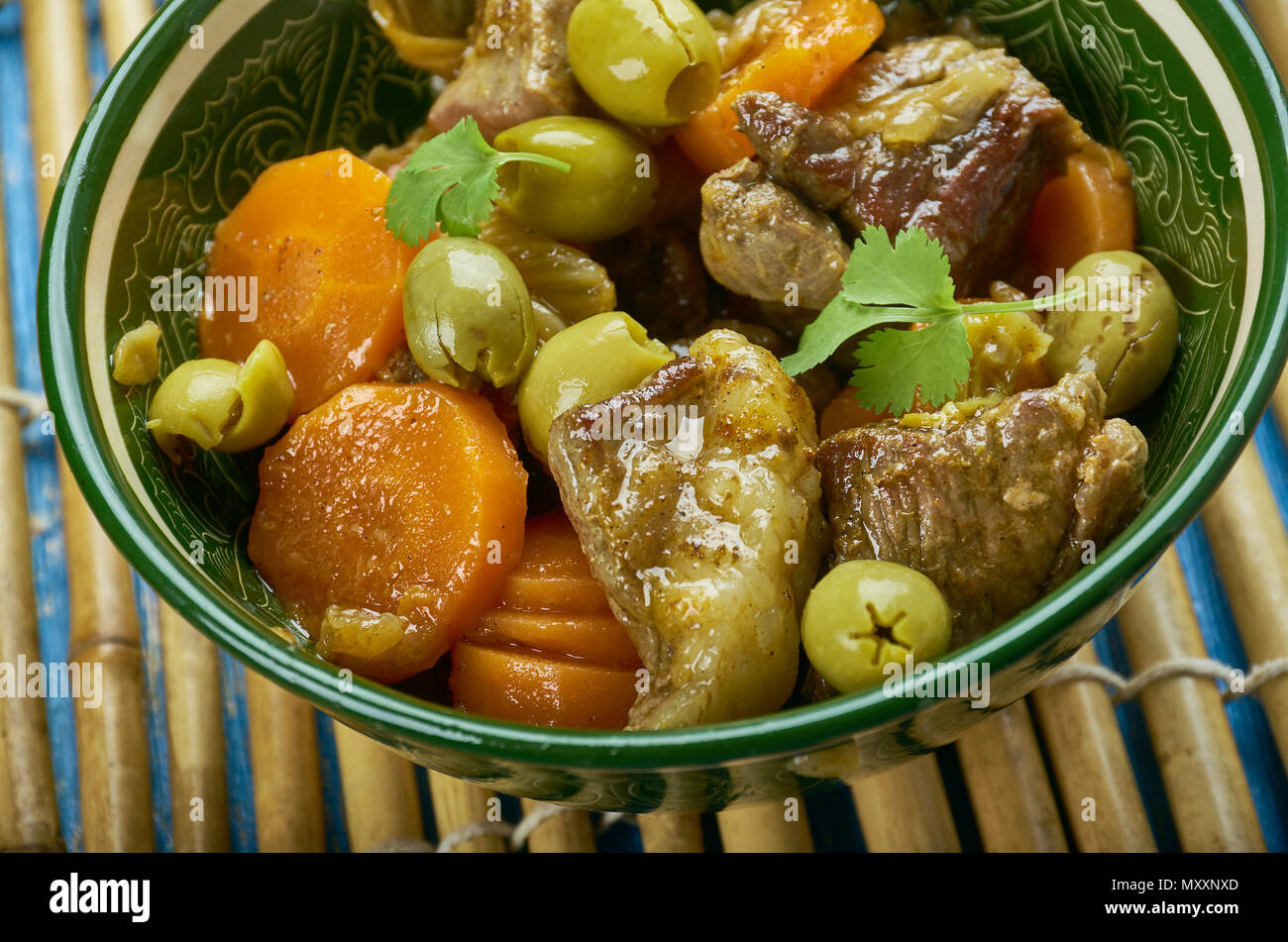 Moroccan lamb tagine with green olives Stock Photo Alamy