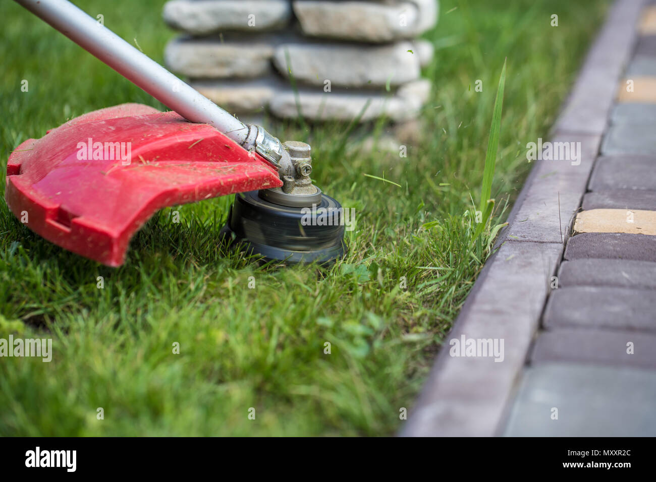 Manual hand grass cutter hires stock photography and images Alamy