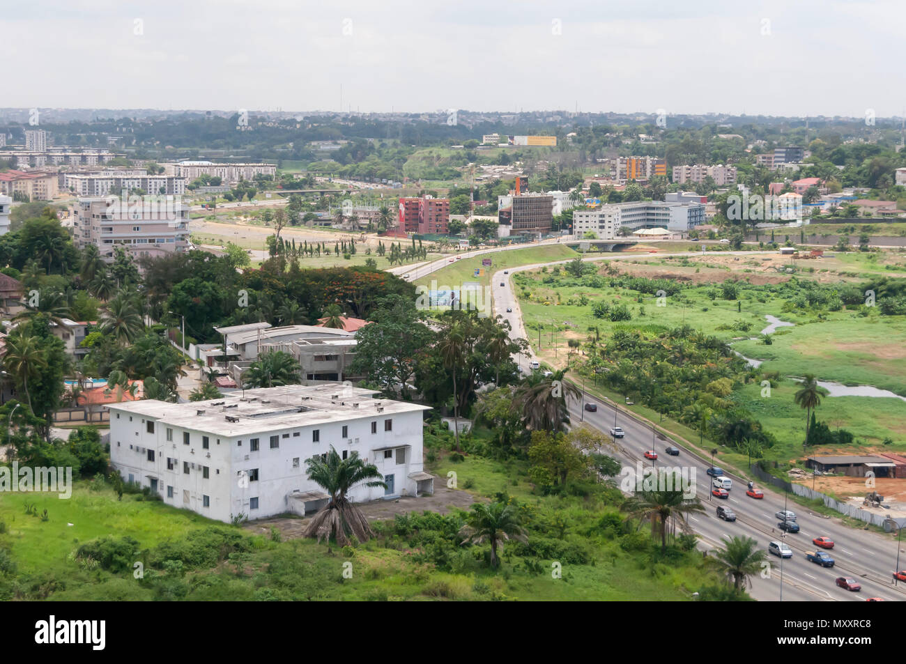 ABIDJAN, IVORY COAST, AFRICA. April 2016. The view of Cocody, one of the quarters of Abidjan, the largest city in the Ivory Coast. Abidjan cityscape. Stock Photo